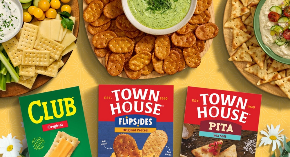 Club and Townhouse Cracker packages surrounded by crackers on plates.