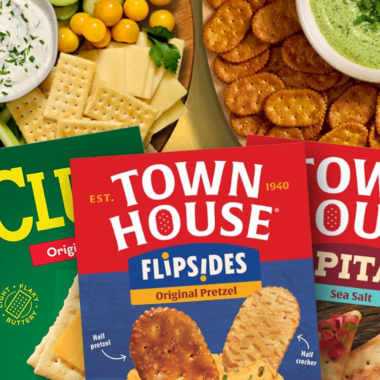 Club and Townhouse Cracker packages surrounded by crackers on plates.