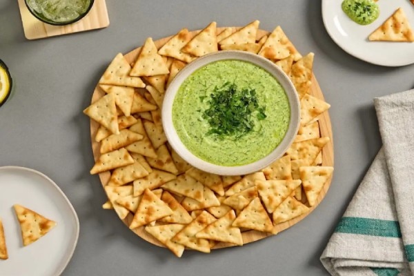 Green goddess dip and trianglular crackers