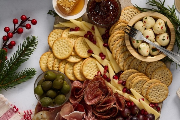 classic charcuterie board with cured meats, cheeses, and dried fruits